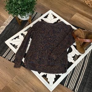 Beautiful multi-colored sweater. Size medium (8-10).